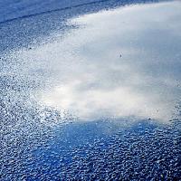 Pixwords Vaizdas su vanduo, asfaltas, dangus, atspindys, kelio Bellemedia - Dreamstime